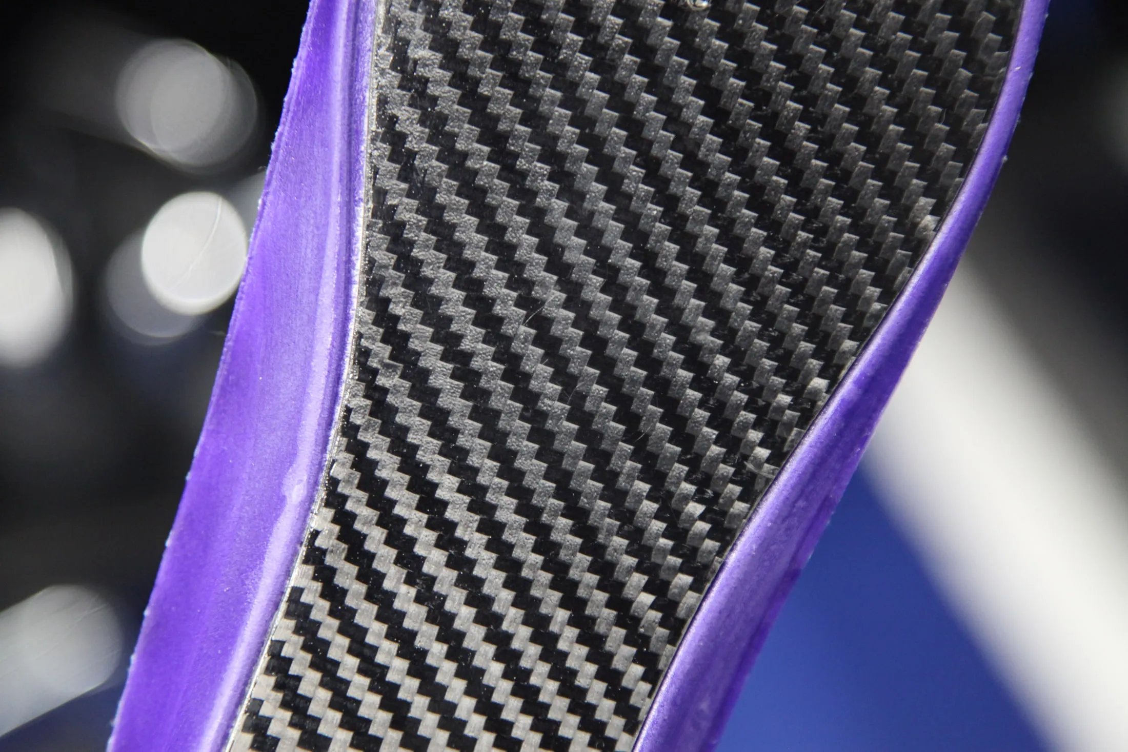 Macro of the carbon fibre weave in profile