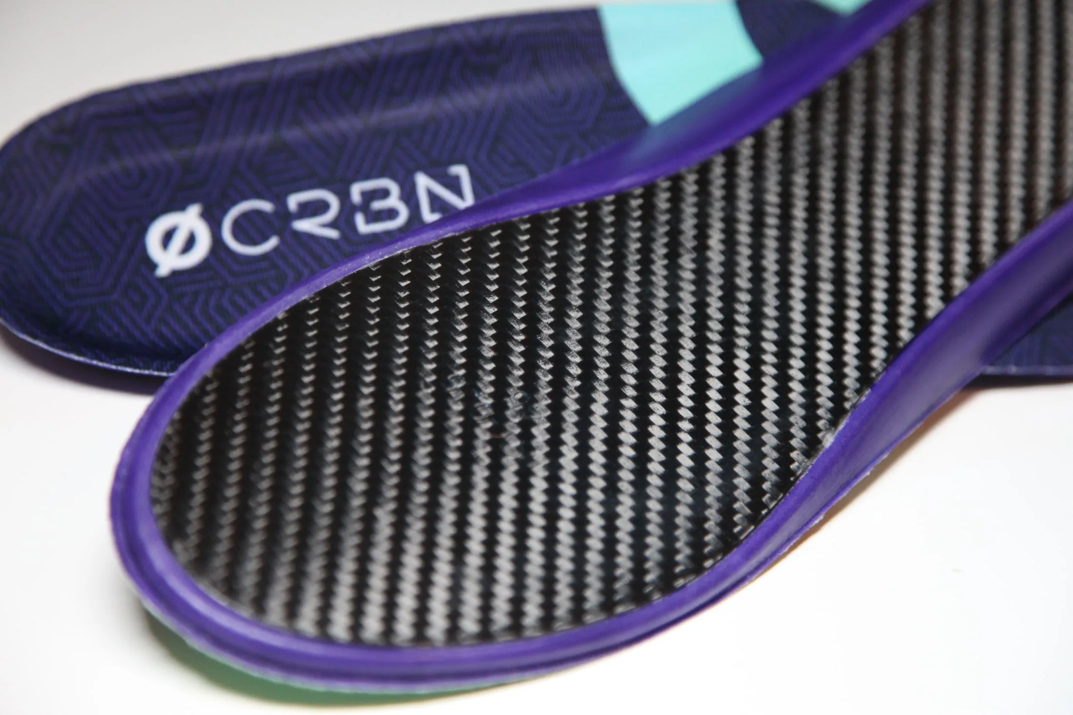 Macro of the full-length carbon fibre baseplate
