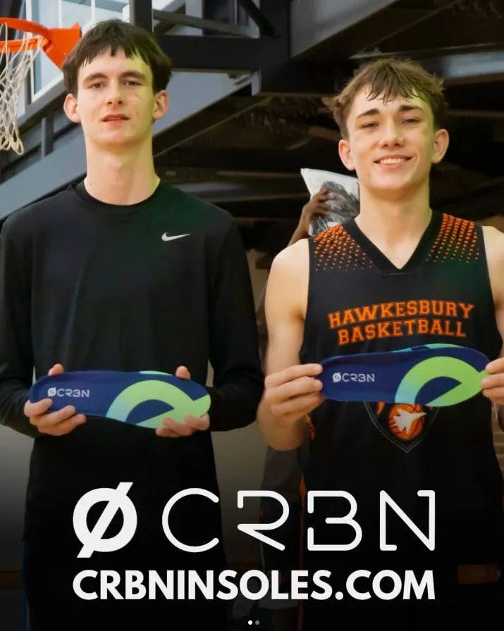 Two players holding their CRBN V2 insoles