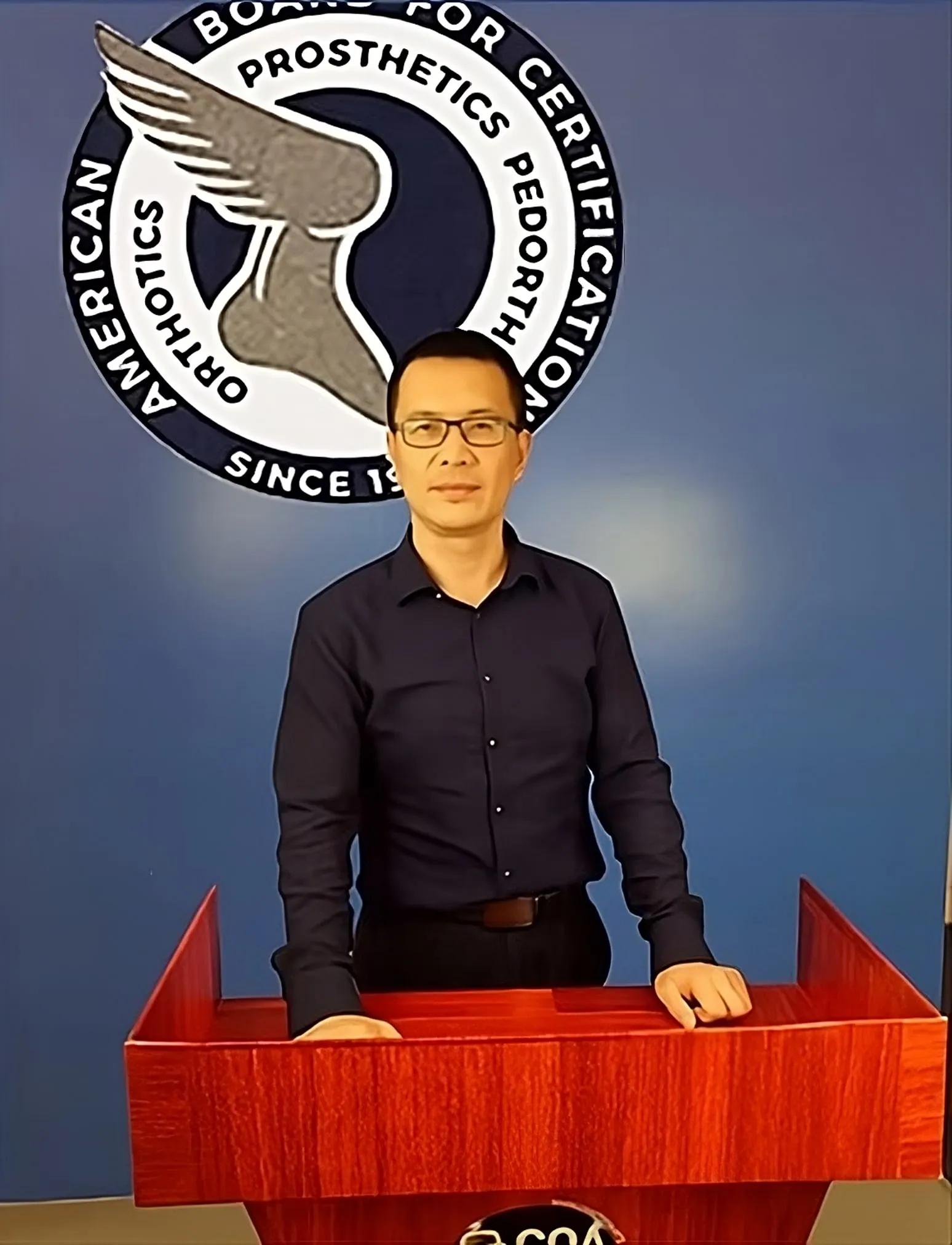Karl Kang, Certified Pedorthist, beside the American Board for Certification in Orthotics, Prosthetics and Pedorthics emblem