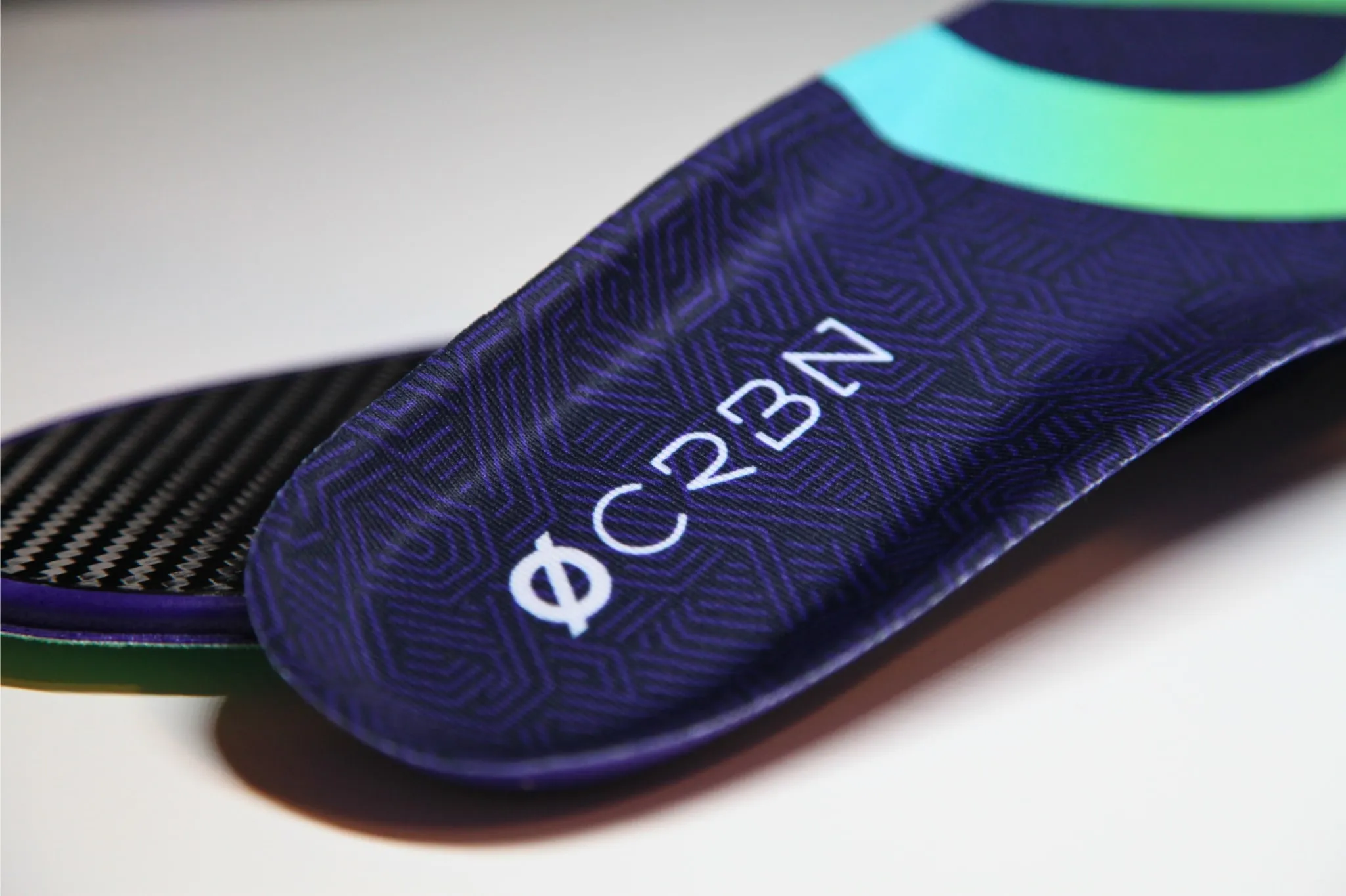 Close-up of the CRBN V2 heel zone, top sheet over carbon